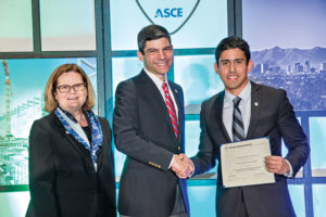 Fernando Martinez receiving his SEI Young Professional Scholarship certificate from SEI President David Odeh and SEI Director Laura Champion.