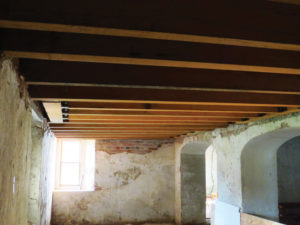 Figure 9. Timber joists taking loads to the sides of masonry arches.
