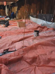 Tarping to protect rebar prior to cold weather placement.