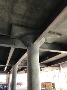 Figure 5. The underside of roof slab reinforced with additional non-composite steel beams.