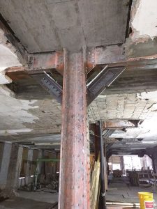 Figure 3. These double angle steel knee braces were installed at approximately 175 locations throughout the interior of the existing building.