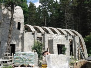 Masonry arches and flying buttresses made with interlocking block by Spherical Block LLC.