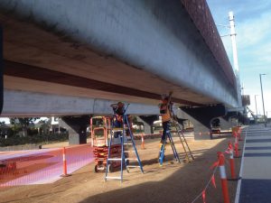 Installation of the PARC MOXI smart monitoring system on one of the VicRoads’ bridges in Victoria, Australia. Based on fiber-optic (FO) sensors, MOXI accurately estimates parameters indicative of the bridge health state.