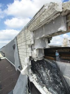 Figure 5. Parapet failure due to lack of anchors at the slip plane of flashing.