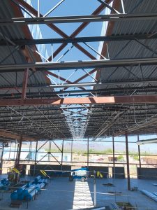 8.5-foot-wide skylight illuminates the high-volume work bay.