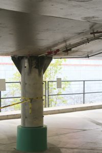 Figure 4. Steel jacketing of the existing concrete column at the parking structure level.