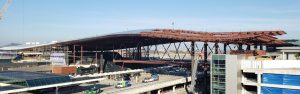 The new terminal roof was lifted a few feet to span over the existing occupied terminal and roadway – offering tremendous structural, architectural, and construction benefits.