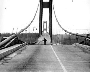 Photographer Howard Clifford, escapes the Tacoma Narrows Bridge during collapse.