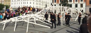 Figure 7. Erection of a temporary reciprocal frame structure on a square in Copenhagen.