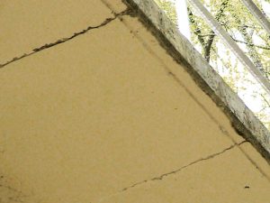 Figure 4. Cracks in the upper walkway along the north wall. This was caused by the excessive displacement of the wall.