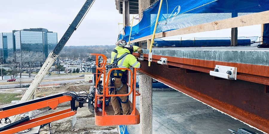  Contractors install facade cladding using the straight-edge, bolted Edge-Tie™ system from Simpson Strong-Tie that eliminates the need for field-welding bent plate pour stops on structural steel projects.