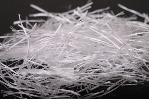 Blend of synthetic microfibers and macrofibers for concrete applications.