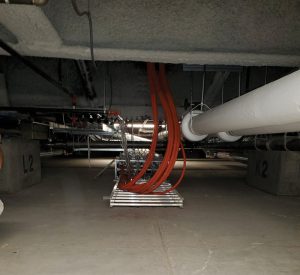 Figure 1. Various utilities go in and out of data center facilities into a crawl space of a seismically isolated building.